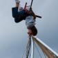 A kid having fun on the bungee jump at the Colorado Irish Festival