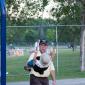 John Miller and Michael Weber playing on the swings at the Colorado Irish Festival