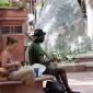 A musician plays on the Pearl Street Mall in Boulder, CO