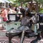 A sculpture on the Pearl Street Mall in Boulder, CO, entitled "Hearts on a Swing", by George Lundeen