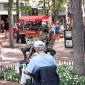 A man sketches "Hearts on a Swing" on the Pearl Street Mall in Boulder, CO