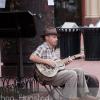 A guitar player on the Pearl Street Mall in Boulder, CO