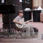 A guitar player on the Pearl Street Mall in Boulder, CO