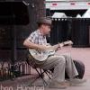 A guitar player on the Pearl Street Mall in Boulder, CO
