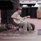 A guitar player on the Pearl Street Mall in Boulder, CO