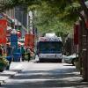 A bus drives down the 16th Street Mall in downtown Denver, CO