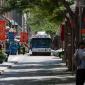 A bus drives down the 16th Street Mall in downtown Denver, CO