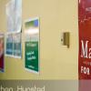 Campaign signs on the walls at the SD59 convention