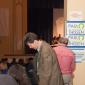 Majority Leader Larry Pogemiller speaks with a delegate