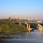 Downtown Minneapolis during rush hour from the Franklin Avenue Bridge. The Interstate 94 bridge across the river can be seen.