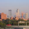 Downtown Minneapolis during rush hour from the Franklin Avenue Bridge. The Interstate 94 bridge across the river can be seen.