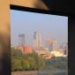 A bridge pier for the Dartmouth Bridge frames downtown Minneapolis.