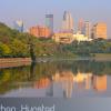 Downtown Minneapolis reflected in the Mississippi River.