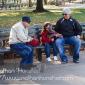 A girl plays with squirrels in Battery Park