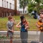 A folk band performs at Grand Old Day on 7 June 2009