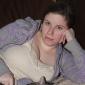 Julia Miller snuggles up with ????