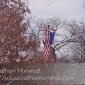 A flag hangs from a cherry picker