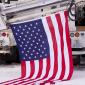 A flag drapes along the ground in front of the House of Hope Presbyterian Church on Summit Avenue
