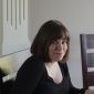 Julia Miller at the table