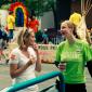 Rep. Marion Greene and Rep. Carly Melin talk at Twin Cities Pride.