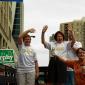 Rep. Alice Hausman and Sen. Mary Jo McGuire wave to the crowd.
