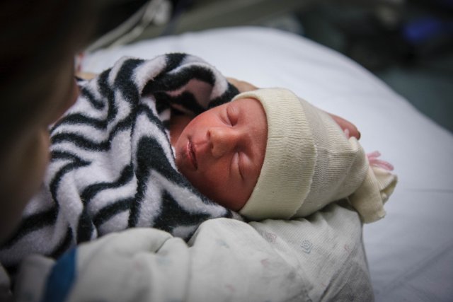 Julia holding Sonja for the first time