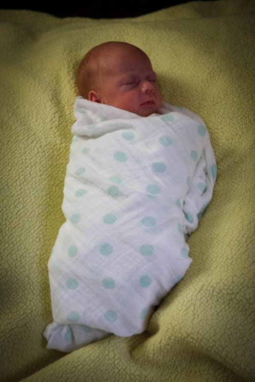 Sonja swaddled and asleep