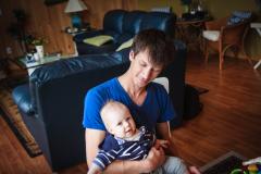 Sonja sitting on Uncle Matt's lap