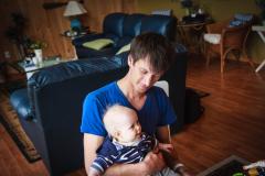 Sonja sitting on Uncle Matt's lap